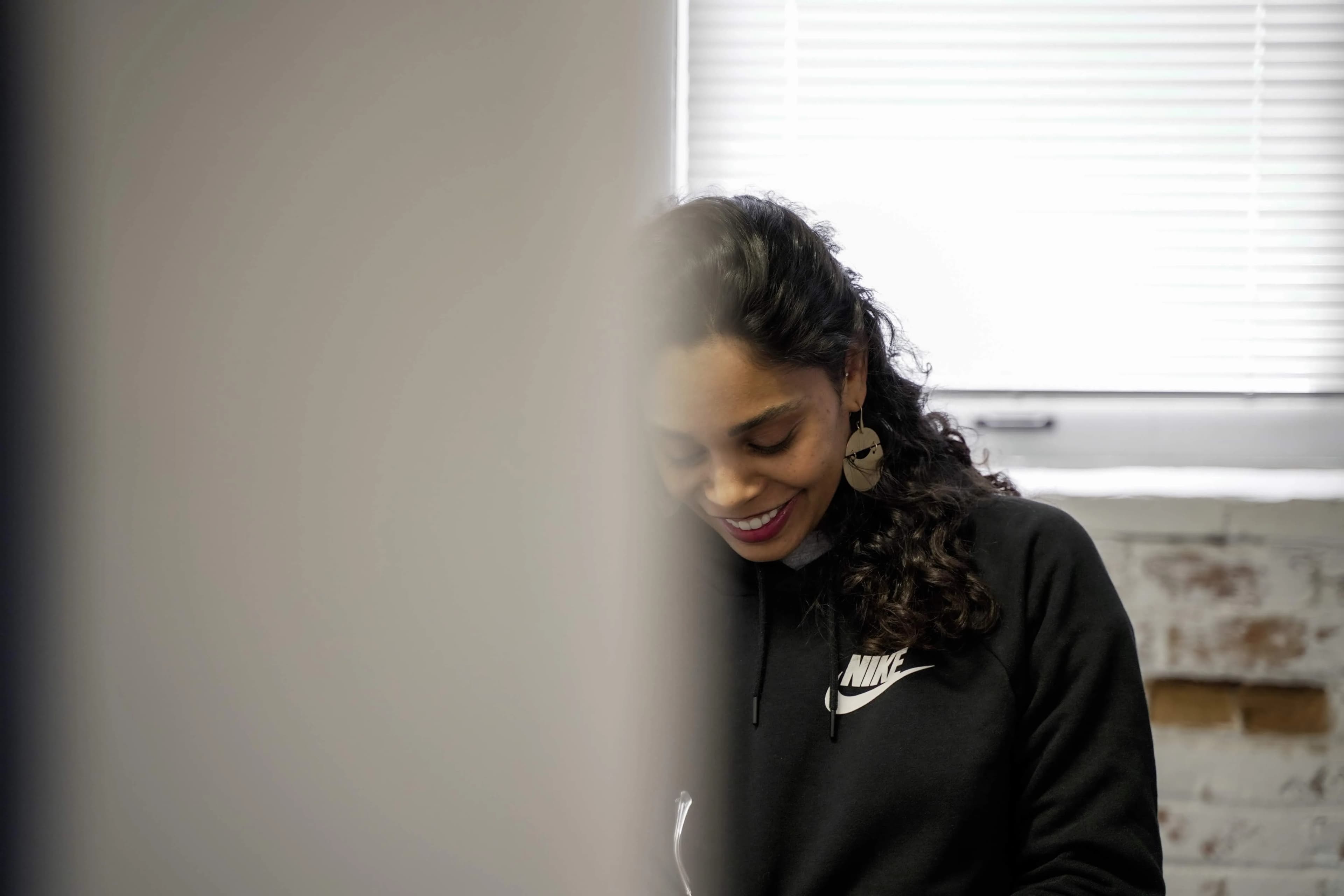 Angela Lucas at her desk
